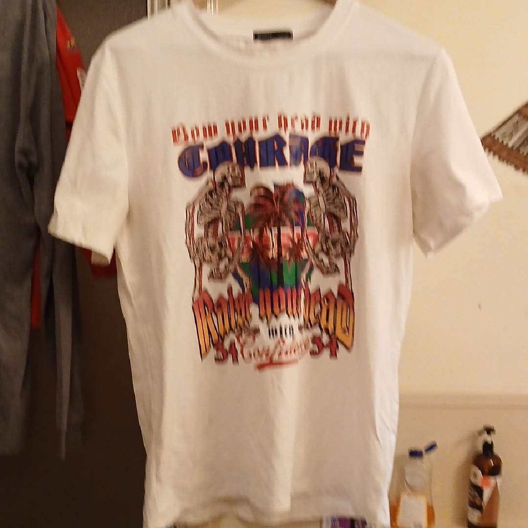 Romwe Cream T-Shirt.",Bow Your Head W Courage". Men's L